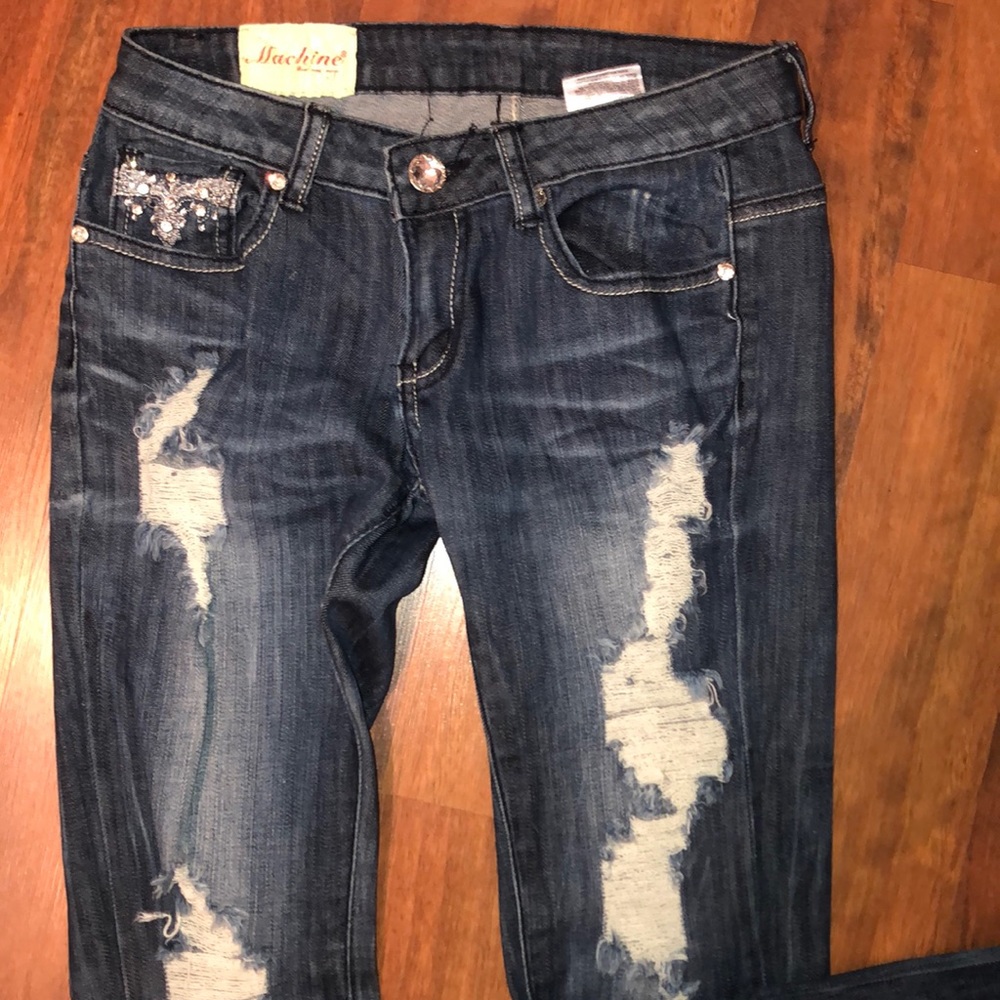 Ripped blue jeans with Rhinestones